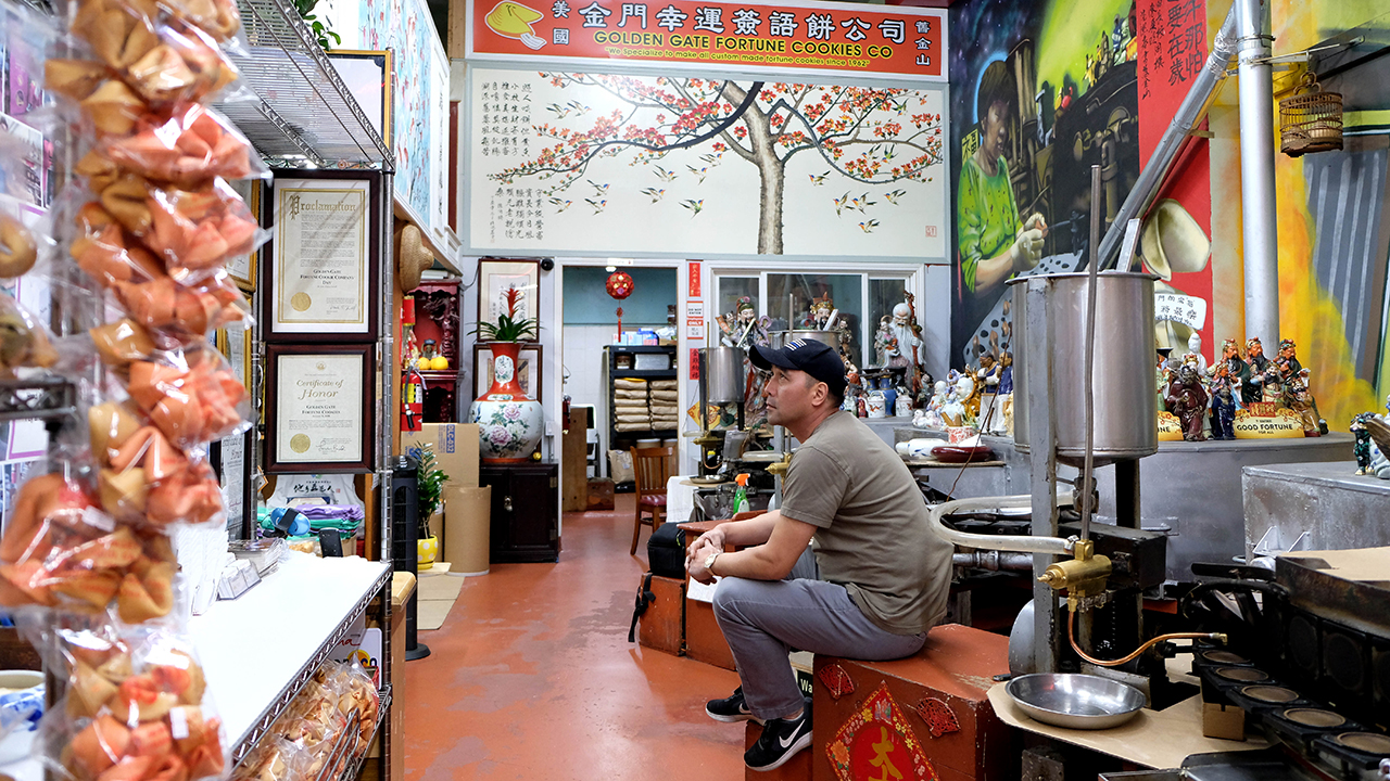 Owner Kevin Chan's Golden Gate Fortune Cookie Factory in San Francisco has struggled as restaurants remain closed in response to the COVID-19 outbreak. (Xinhua/Wu Xiaoling via Getty Images)