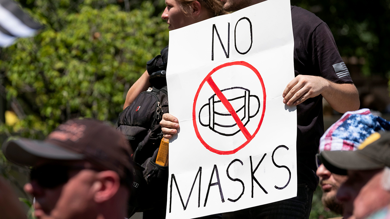Republicans, Democrats differ on why masks are a downside of COVID19