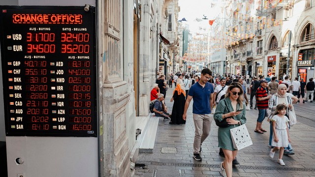 Exchange rates displayed at a currency exchange bureau in Istanbul, Turkey, on June 5, 2024. (Umit Turhan Coskun/NurPhoto via Getty Images)