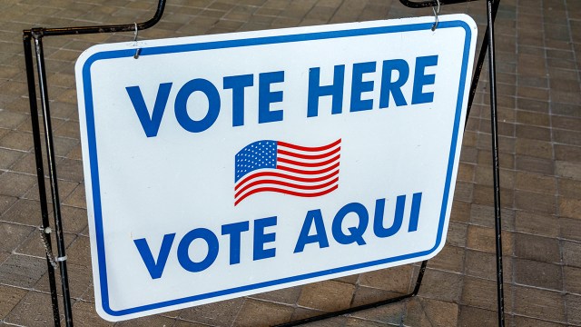 A bilingual voting sign at City Hall in Miami Beach, Florida. (Jeff Greenberg/Universal Images Group via Getty Images)