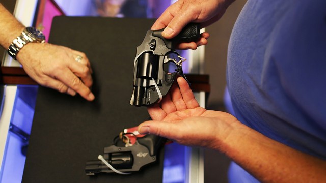 A customer shops for a handgun at a gun store in Florida. (Joe Raedle/Getty Images)