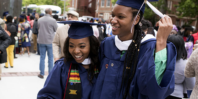 Friends celebrate their graduation from Howard University in Washington, D.C., in 2017. (Marvin Joseph/The Washington Post via Getty Images)